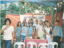 Group picture of the first communion of church members w/ Ptr. Cesar and Leonora.